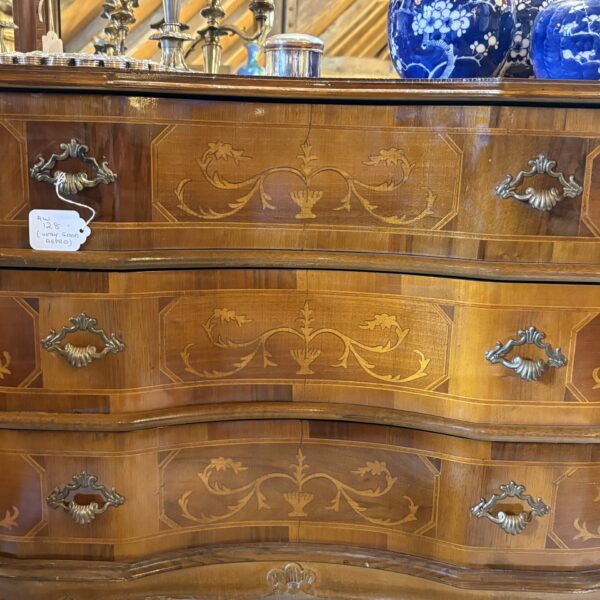 Reproduction serpentine , French style chest of drawers